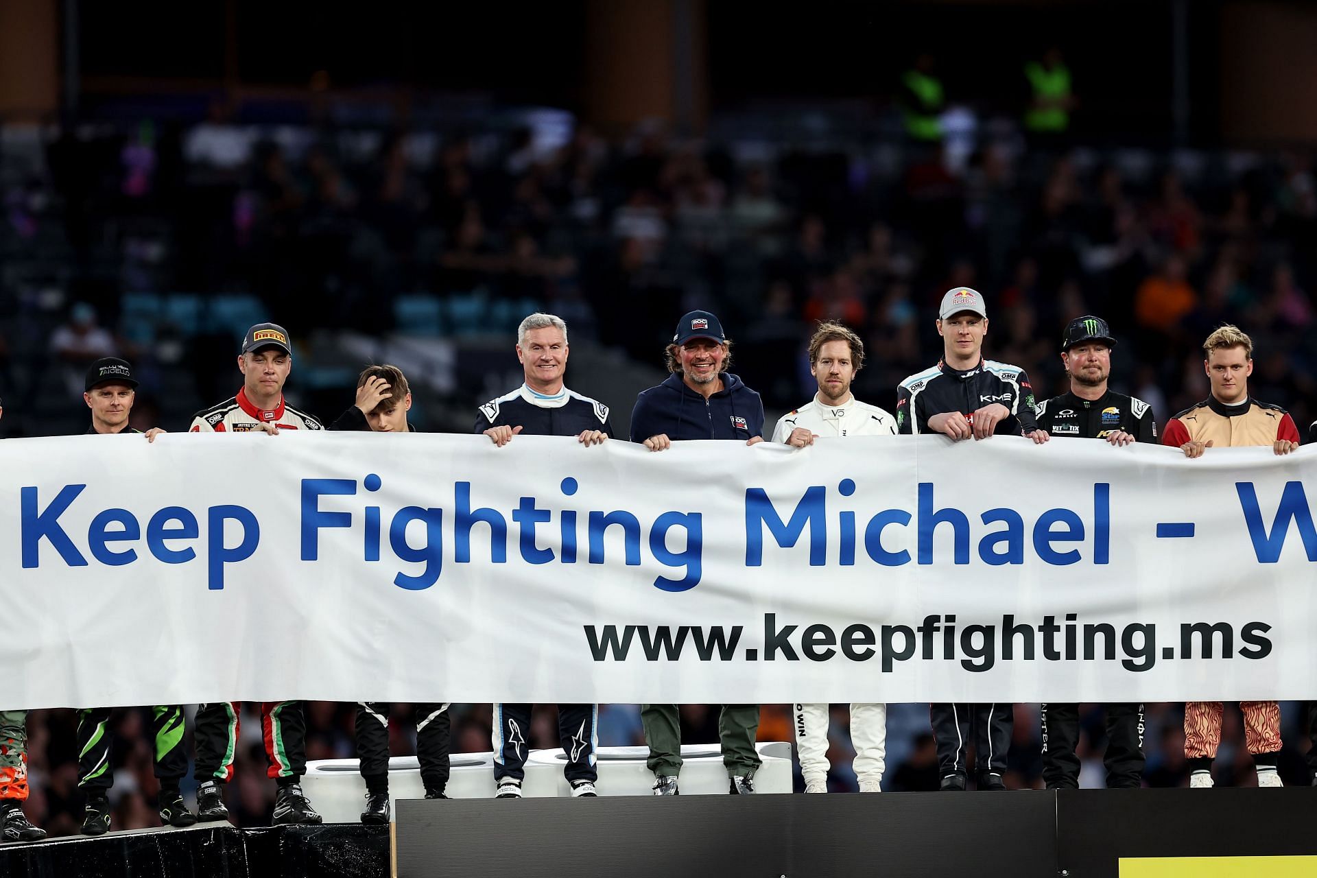 Keep Fighting Michael banner at the 2025 Race Of Champions - Source: Getty